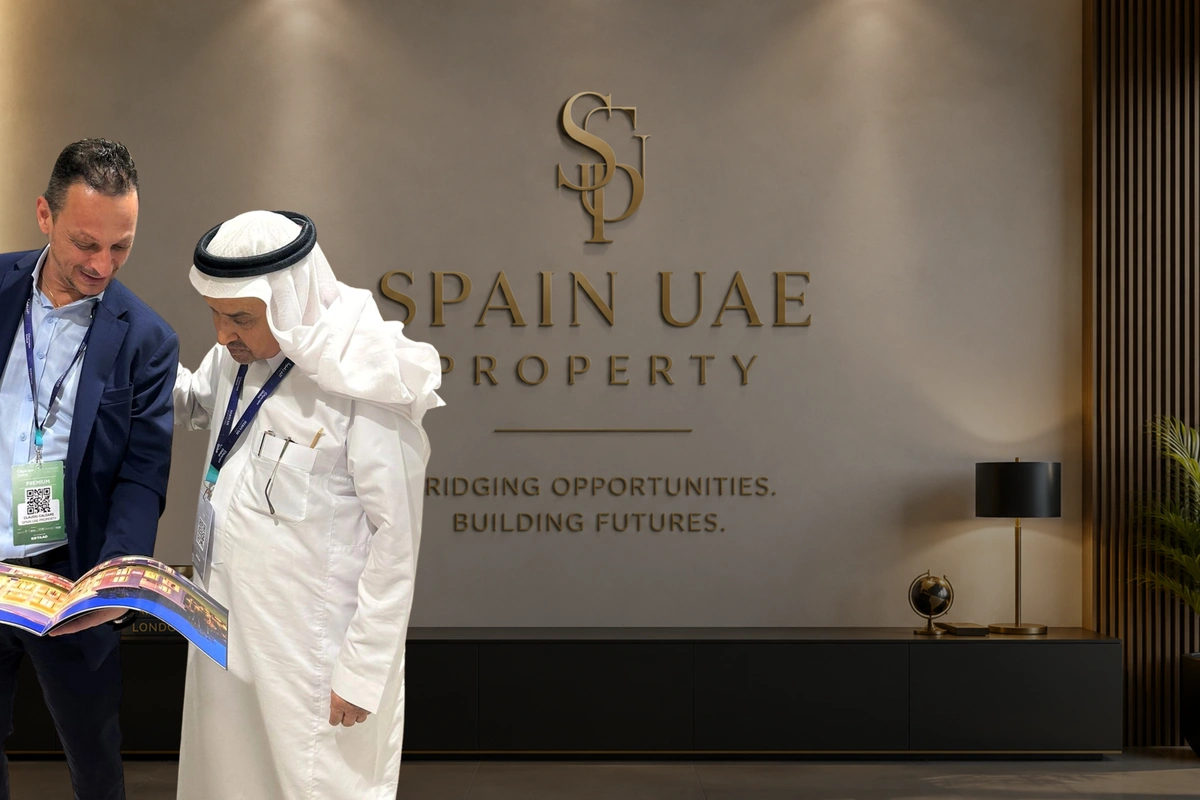 Claudio Caldare presenting a property portfolio at the Spain UAE Property stand.